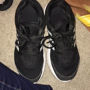 Black adidas cloud foam tenni shoes